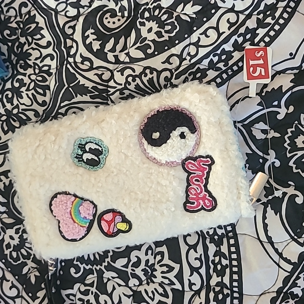 Claires fluffy clutch wallet